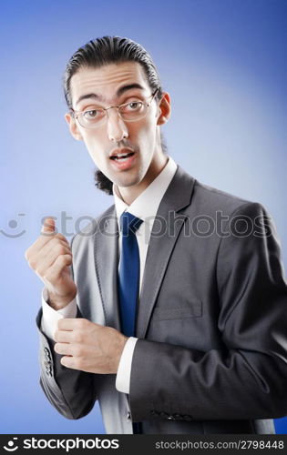 Young businessman in studio shooting