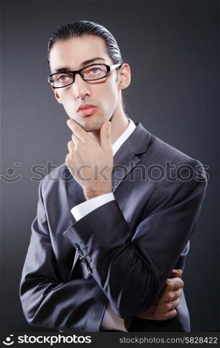 Young businessman in studio shooting