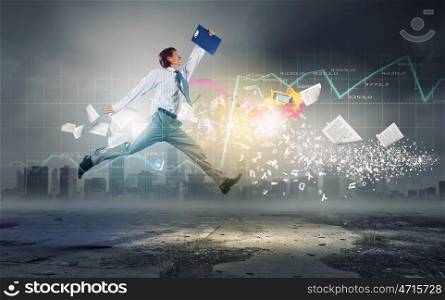 Young businessman in suit running in a hurry. Full speed businessman