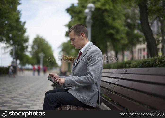 young businessman in suit. young businessman in suit working with laptop