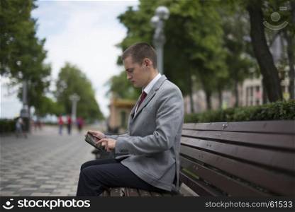 young businessman in suit. young businessman in suit working with laptop