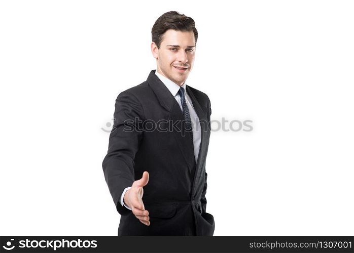 Young businessman in tie and black suit extends his hand, isolated on white background