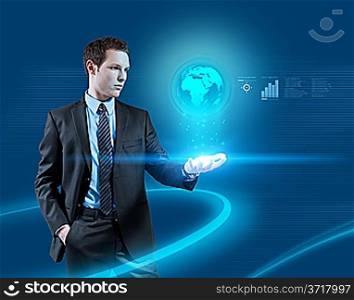 Young businessman navigating in virtual reality interface. Glowworms in a ray of light below the globe hologram. Future technology collection. One of a series.