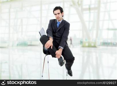 young businessman on a chair at the office