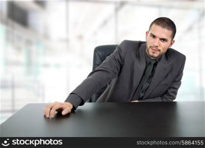 young businessman on a desk, at the office