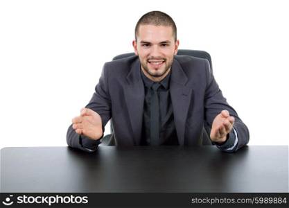 young businessman on a desk, isolated on white