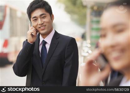 Young Businessman on the phone, portrait, Beijing