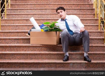 Young businessman on the street after dismissal