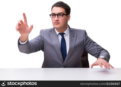 Young businessman pressing virtual buttons isolated on white bac. Young businessman pressing virtual buttons isolated on white background