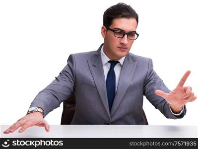 Young businessman pressing virtual buttons isolated on white background. Young businessman pressing virtual buttons isolated on white bac