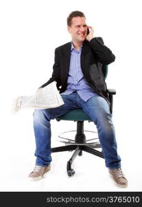 young businessman reads newspaper while phoning job seeking white background