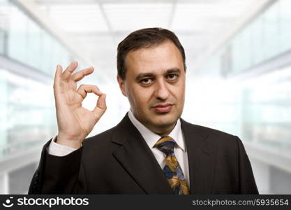 Young businessman showing his hand at the office