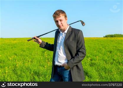 young businessman spends his free time playing golf