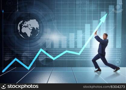 Young businessman supporting economic growth on business chart