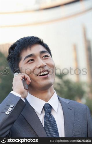 Young Businessman Talking on Cell phone