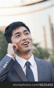 Young Businessman Talking on Cell phone