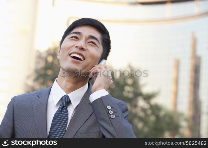 Young Businessman Talking on Cell phone