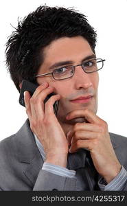 young businessman talking on his cell