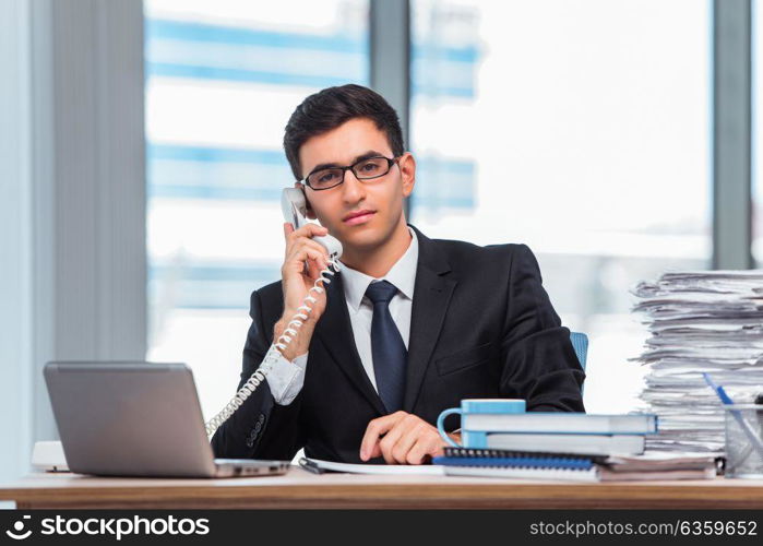 Young businessman talking on the phone