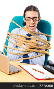 Young businessman tied with rope