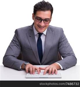 Young businessman typing on a keyboard isolated on white background. Young businessman typing on a keyboard isolated on white backgro
