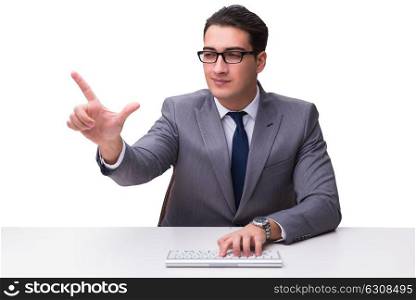 Young businessman typing on a keyboard pressing virtual buttons . Young businessman typing on a keyboard pressing virtual buttons isolated on white background