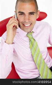 Young businessman using cellphone