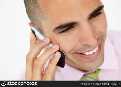 Young businessman using cellphone