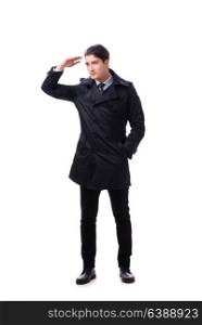 Young businessman wearing winter coat isolated on white