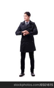 Young businessman wearing winter coat isolated on white