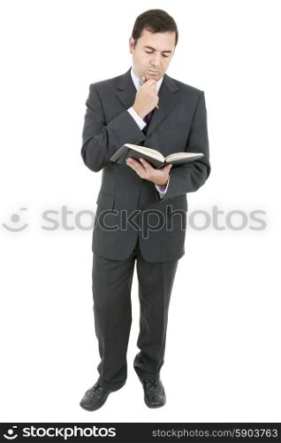 young businessman with a book, thinking, isolated