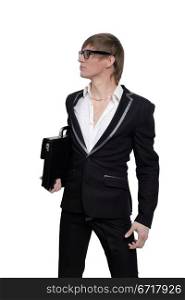 young businessman with a briefcase on white gray background