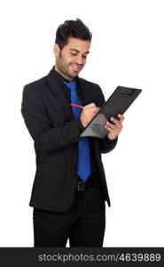 Young businessman with a clipboard isolated on white background