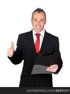 Young businessman with a clipboard saying Ok isolated on white background