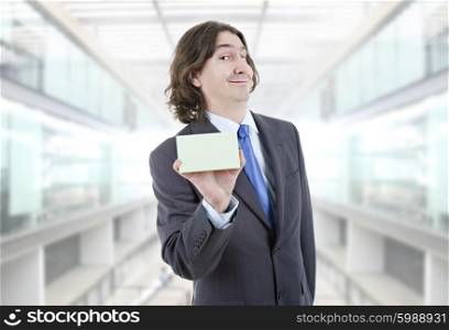 young businessman with a empty card at the office