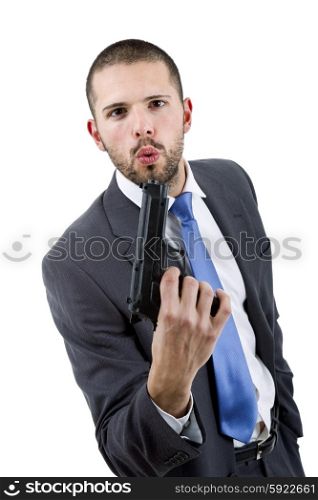 young businessman with a gun, isolated on white