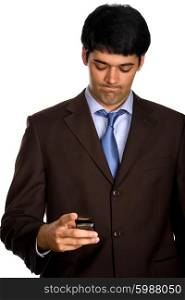 young businessman with a phone in white background