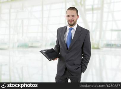 young businessman with a tablet pc, at the office