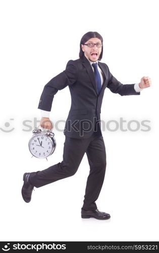 Young businessman with clock on white