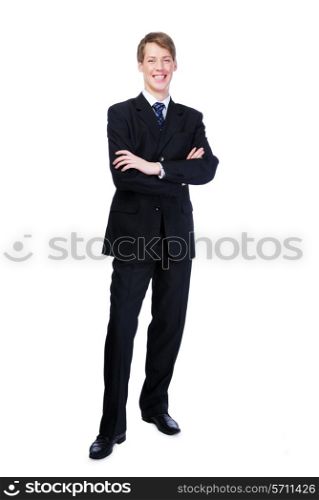 Young businessman with crossed hands standing against - on white