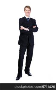 Young businessman with crossed hands standing against - on white