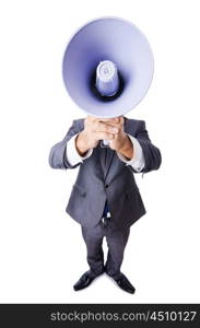 Young businessman with loudspeaker on white