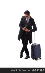 Young businessman with suitcase ready for business trip on white