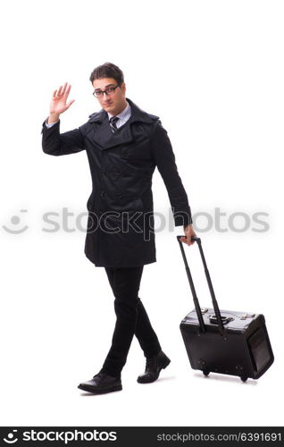 Young businessman with suitcase ready for business trip on white