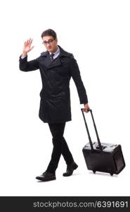 Young businessman with suitcase ready for business trip on white