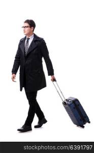 Young businessman with suitcase ready for business trip on white