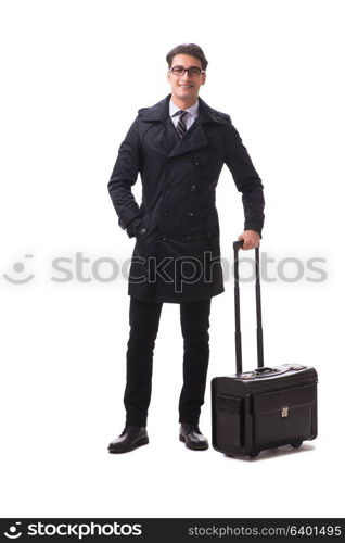 Young businessman with suitcase ready for business trip on white