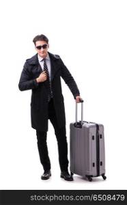 Young businessman with suitcase ready for business trip on white