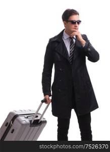 Young businessman with suitcase ready for business trip on white. The young businessman with suitcase ready for business trip on w