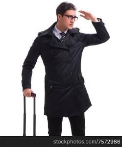 Young businessman with suitcase ready for business trip on white. The young businessman with suitcase ready for business trip on w